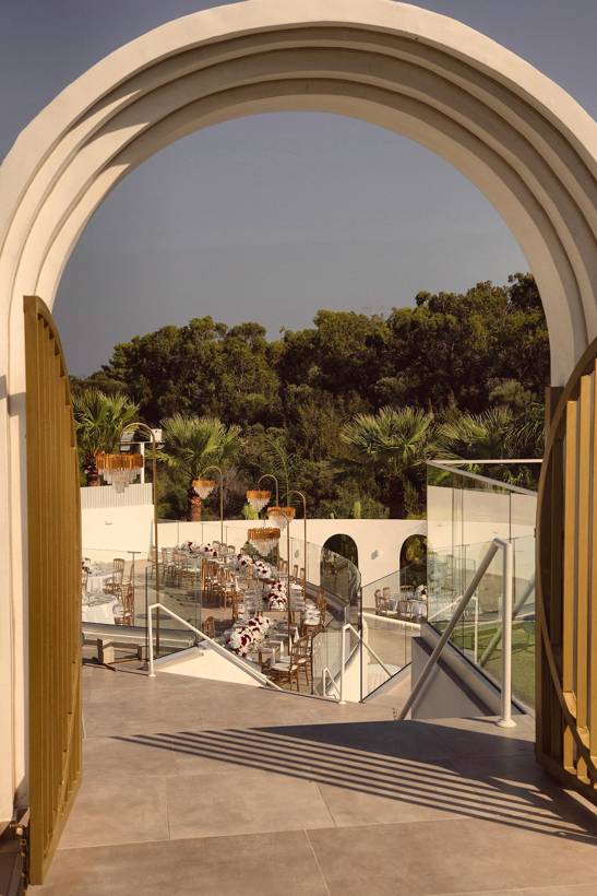 The gold gate arch over the terrace and the hills